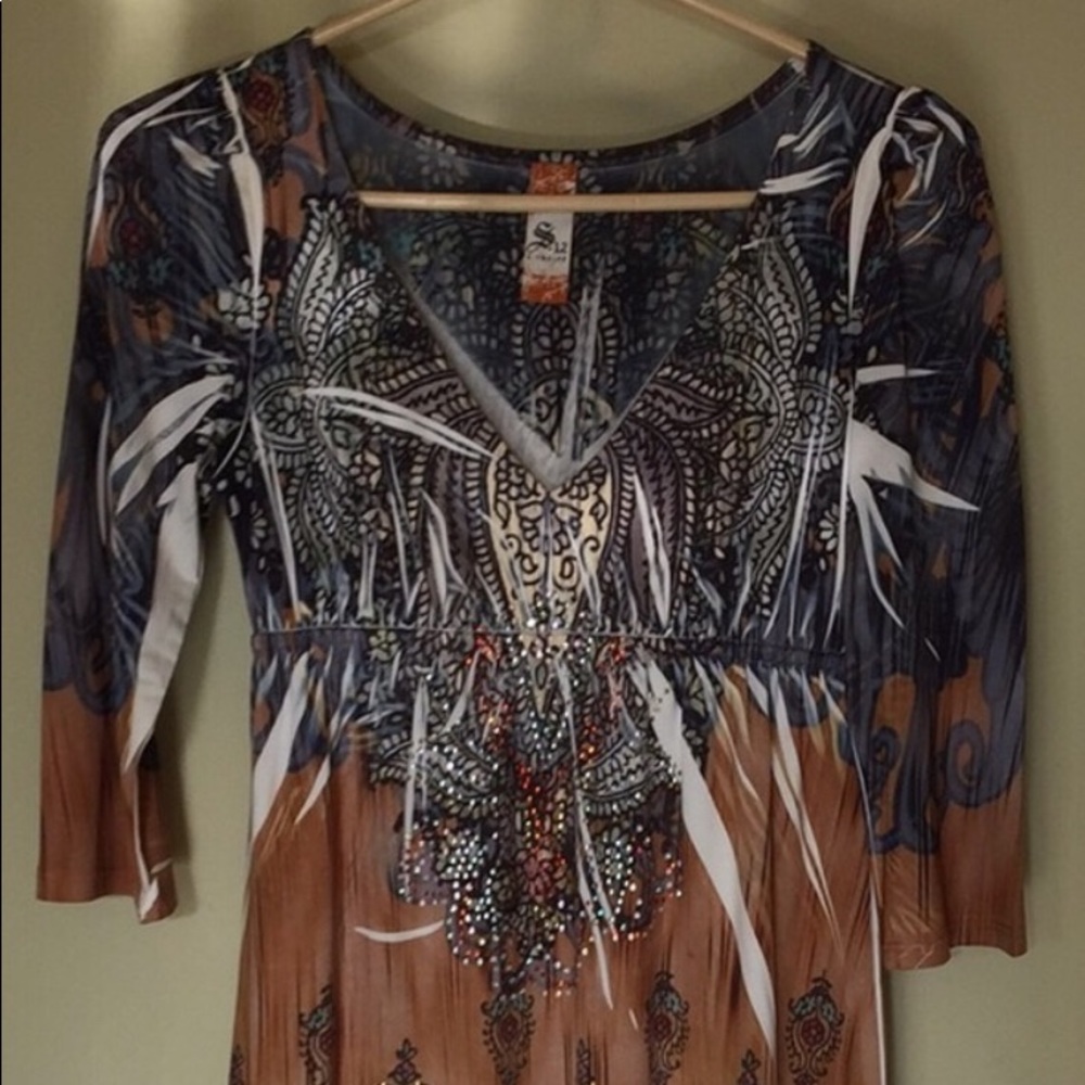 Super cute dress/tunic in excellent condition.